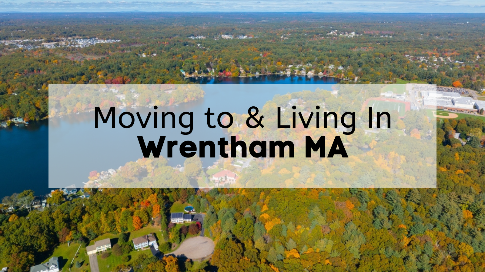 A picturesque glimpse of Wrentham, MA, highlighting its welcoming homes and dynamic community atmosphere for newcomers.