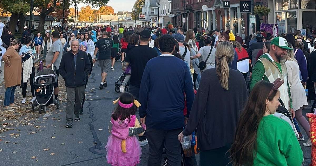 People on the streets of Hudson during a fall festival