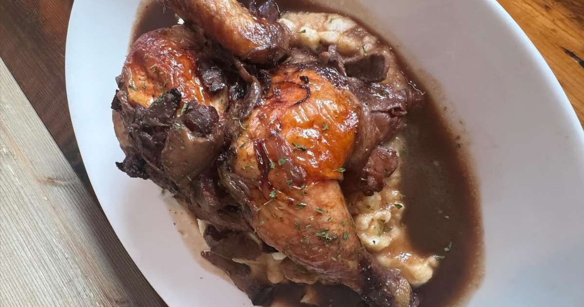 Roasted chicken with mashed potatoes and gravy at Kith and Kin