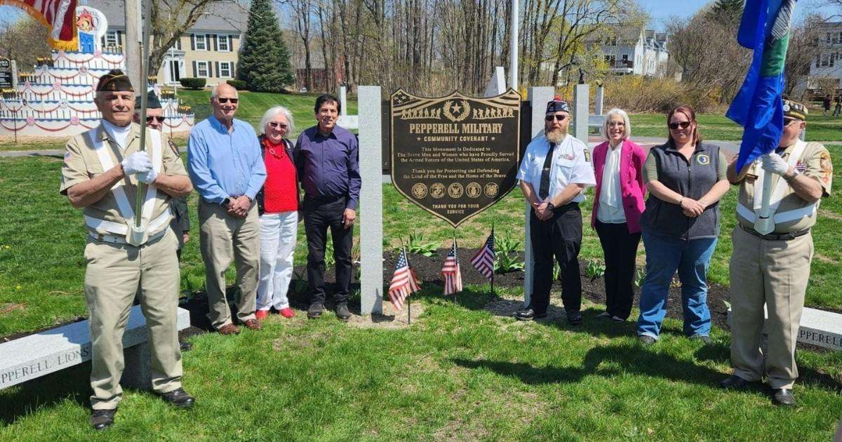 Veterans and other residents living in Pepperell MA dedicating a veterans' memorial